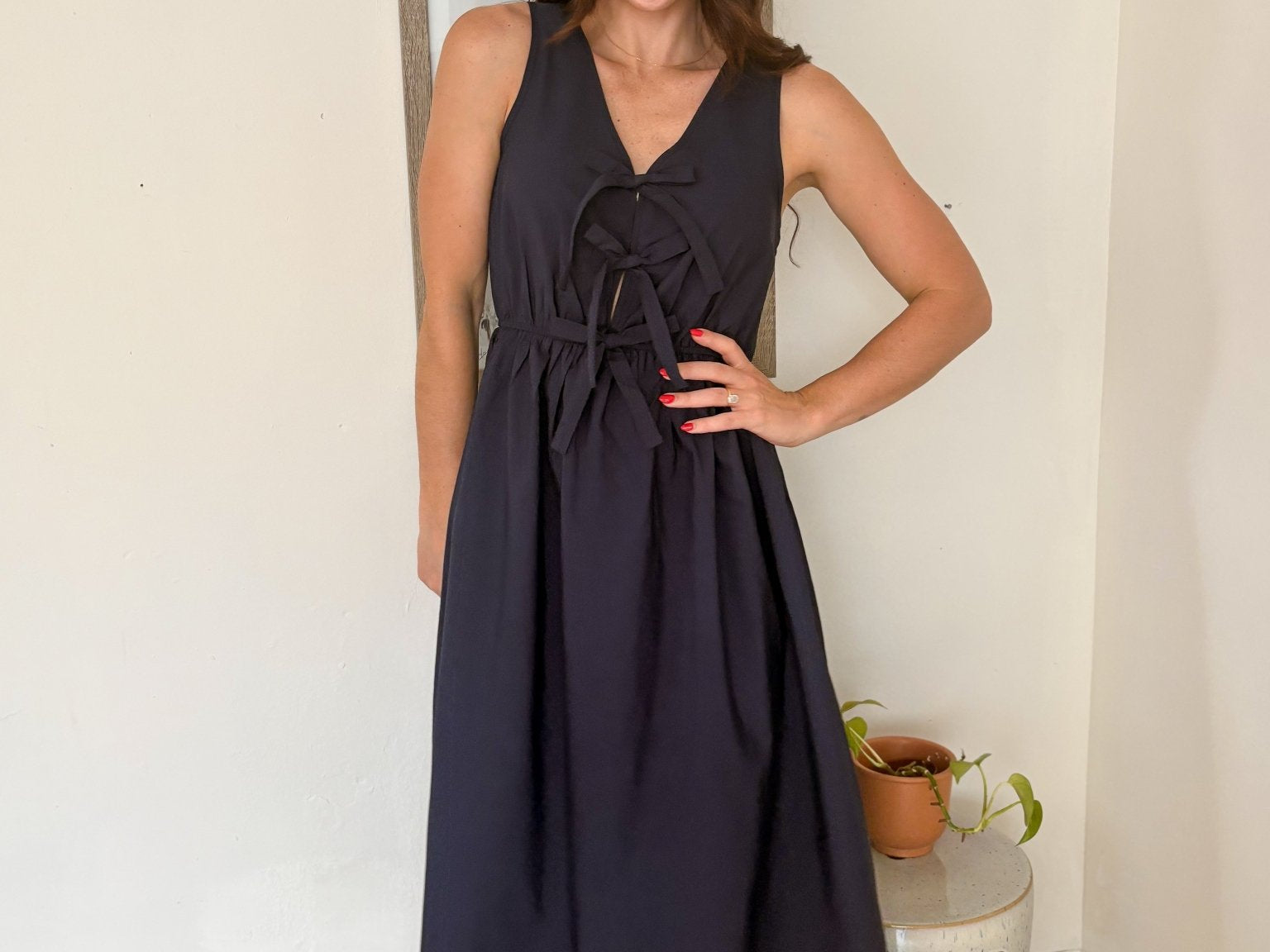 A European Summer Bow Tie Sleeveless Eyelet Hem Midi Dress in Navy - Love and Lee Apparel