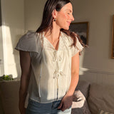 The Robin Pintuck Lace Yoke Ruffle Detail Front Tie Blouse in White - Love and Lee Apparel